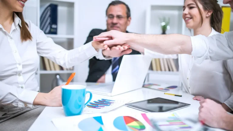 Accountants using CRM software to manage client relationships in a modern office